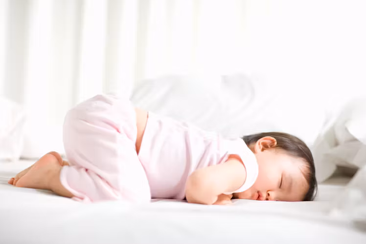 Why Do Babies Sleep with Their Butts in the Air
